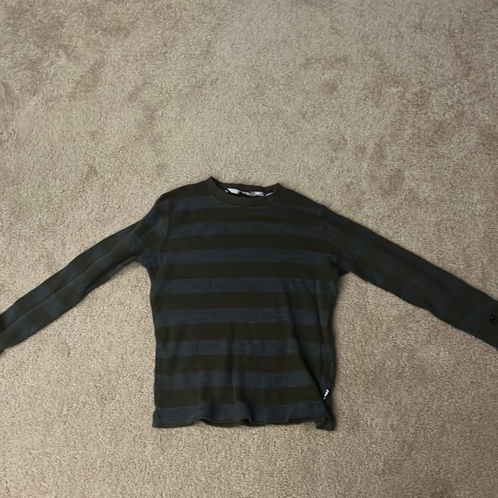 Grey and dark green striped Shaun White long sleeve.
